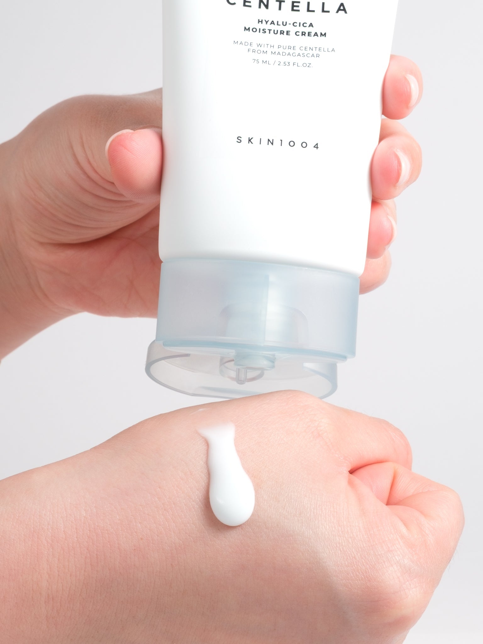 SKIN1004 Hyalu-Cica Moisture Cream squeezed as a dollop onto the back of a hand