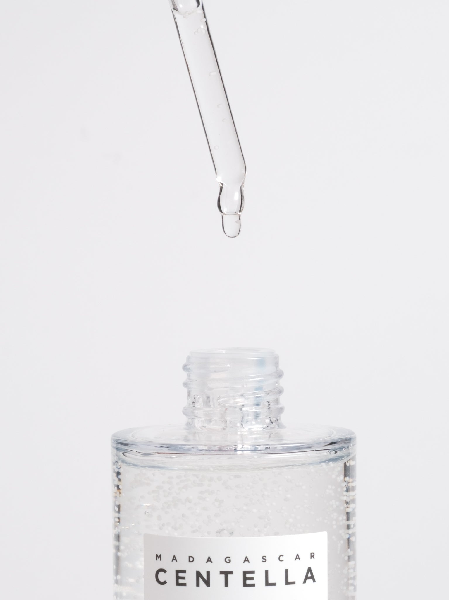 SKIN1004 Madagascar Centella Tone Brightening Capsule Ampoule dropper showing the watery ampoule