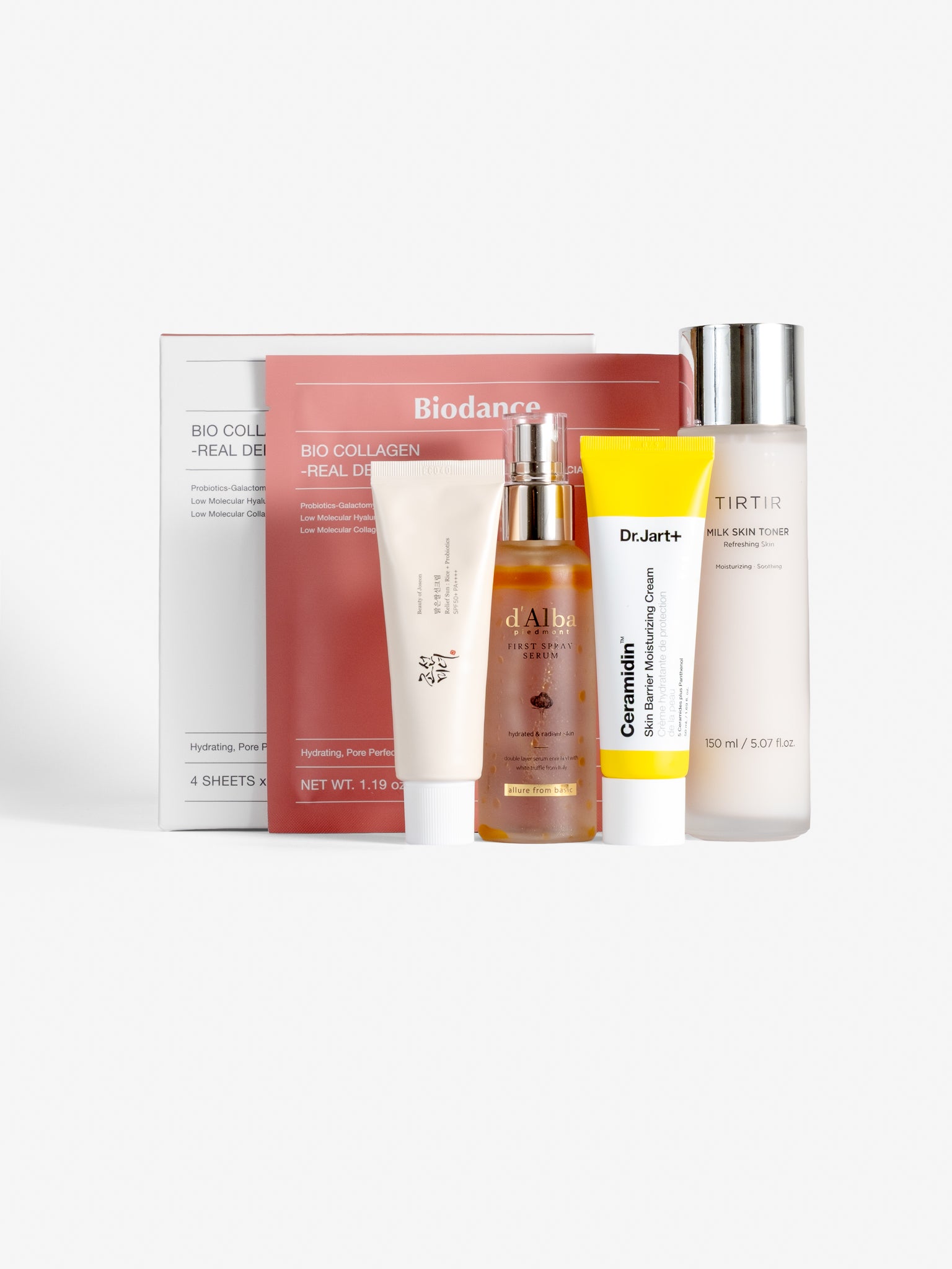 Skincare product set with bio collagen-real deep mask, relief sun: rice+probiotics, Dr.Jart+ ceramidin skin barrier moisturising cream and milk skin toner on a white background