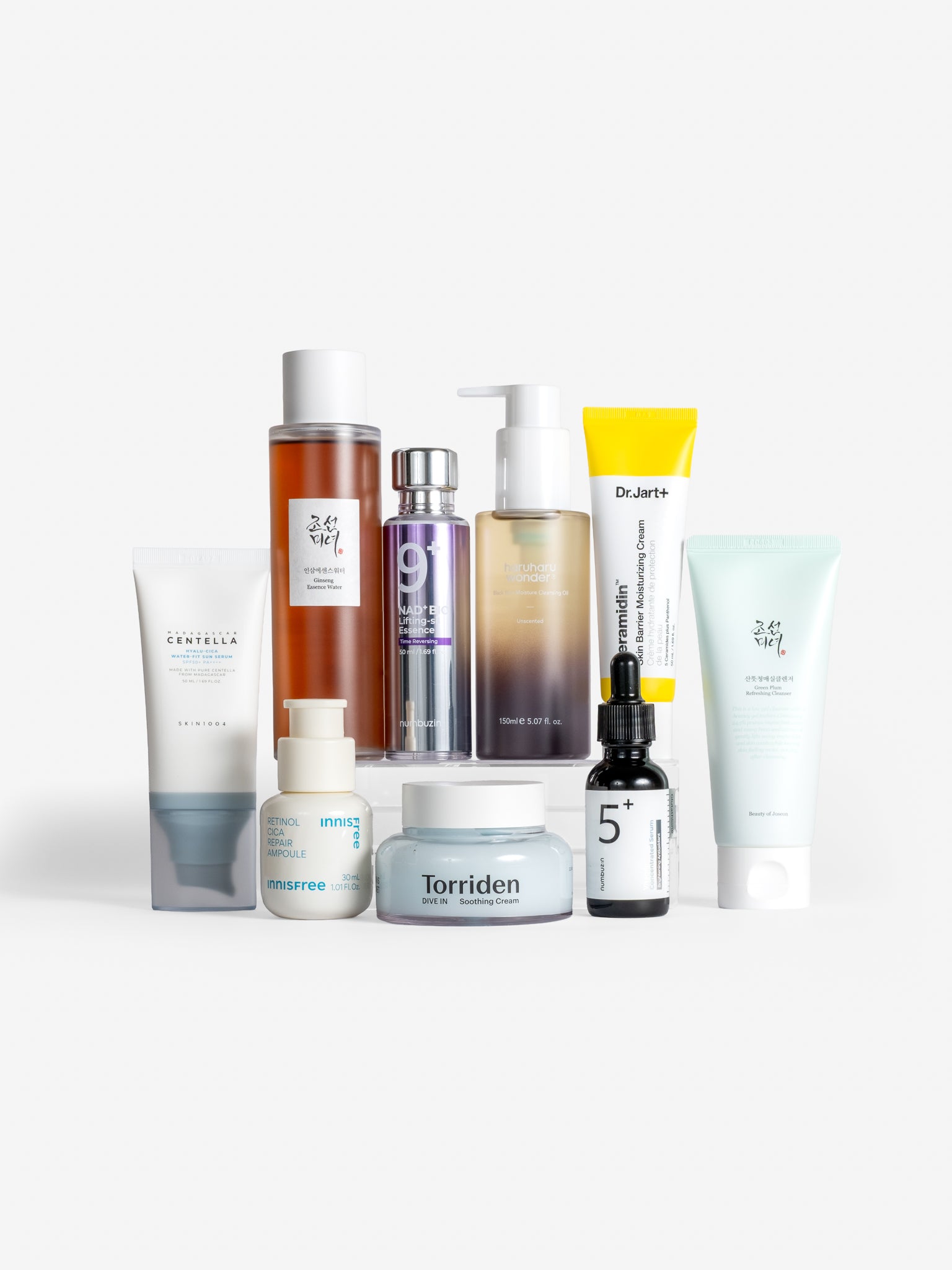 Beauty Of Joseon Ginseng Essence Water, Beauty Of Joseon Ginseng Green Plum Refreshing cleanser, No. 9 Nad+ Lifting Sil Essence, Numbuzin No.5 Vitamin Concentrated Serum, Haru Haru Wonder Black Rice Moisture Deep Cleansing Oil, Torriden Dive-In Low Molecular Hyaluronic Acid Soothing Cream, Innisfree Retinol Cica Repair Ampoule and Dr Jart Ceramidin Skin Barrier Moisturising Cream on white background