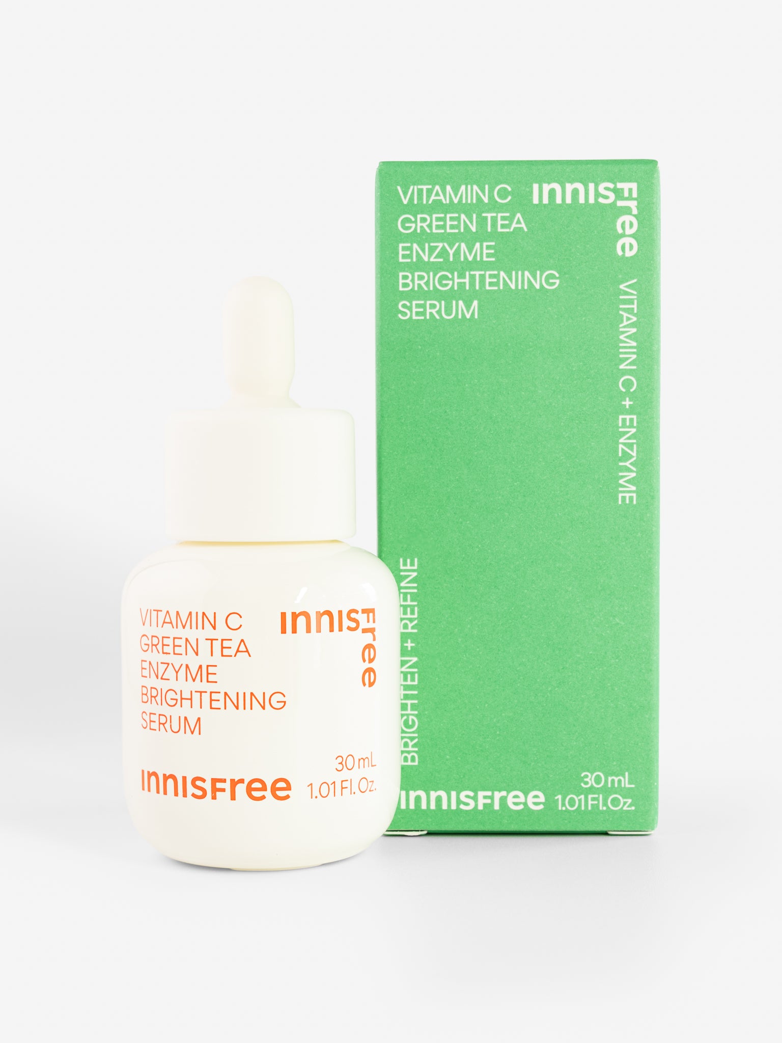 Innisfree Vitamin C Green Tea Enzyme Brightening Serum with packaging on a white background