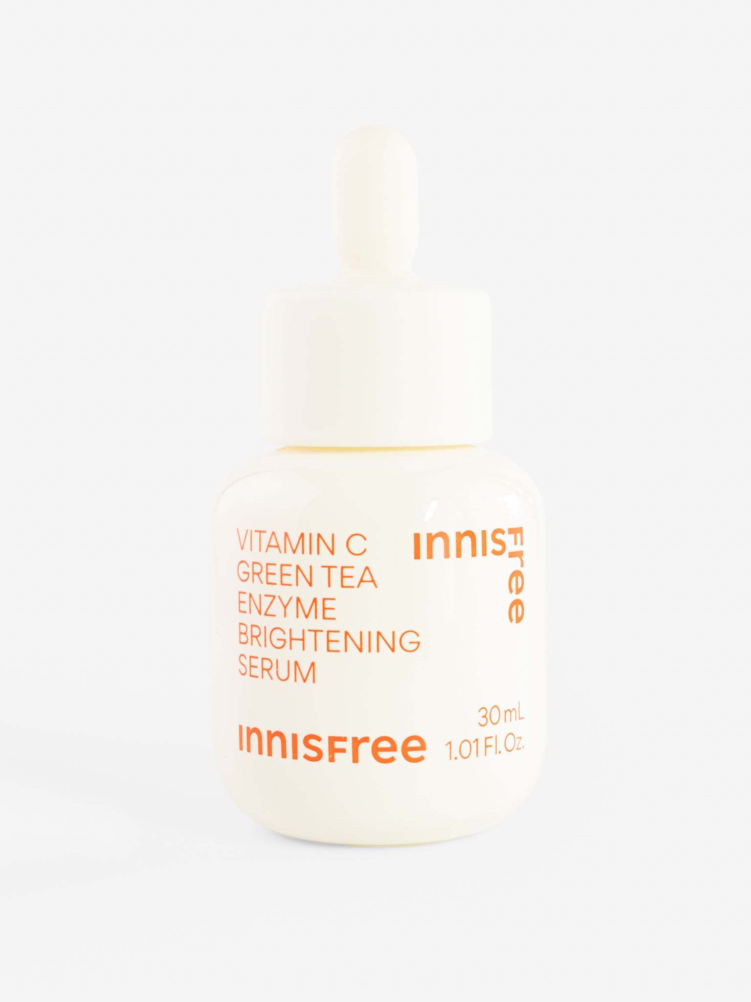 Innisfree Vitamin C Green Tea Enzyme Brightening Serum bottle on a white background