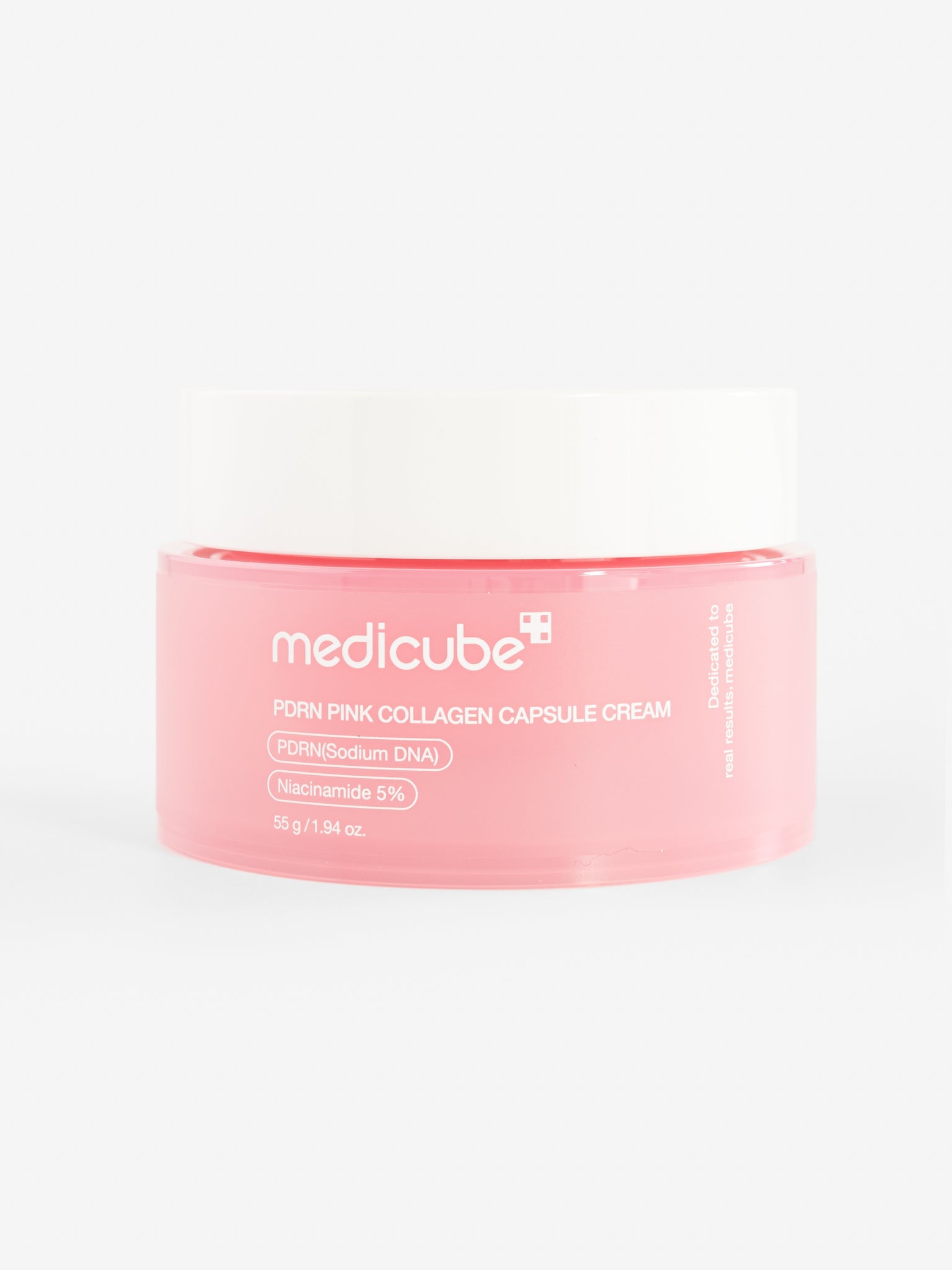 Medicube PDRN pink collagen capsule cream on a white background