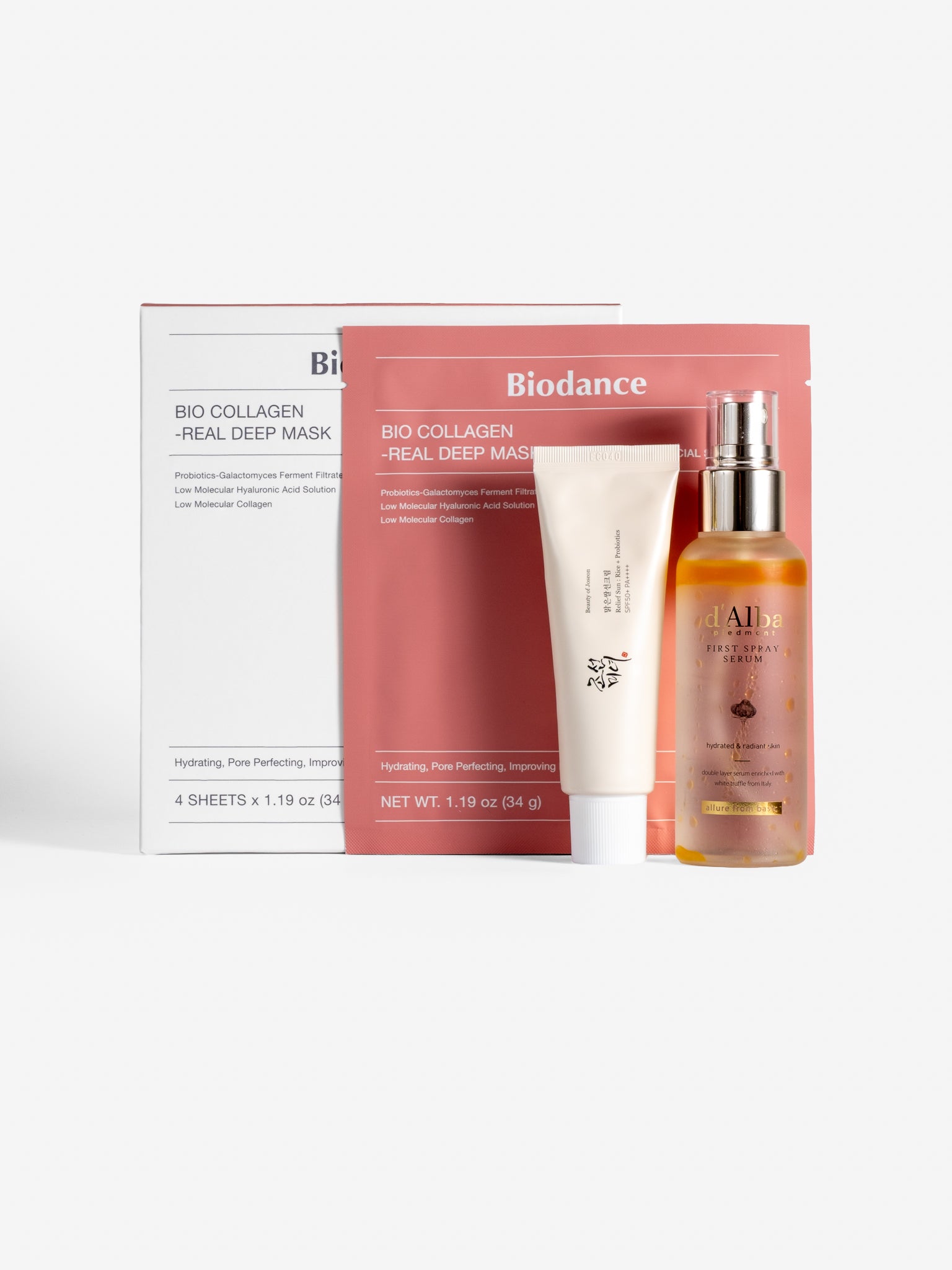 Skincare product set including a biodance bio collagen real deep mask, beauty of joseon relief sun rice + probiotics, and d'alba first spray serum on a white background