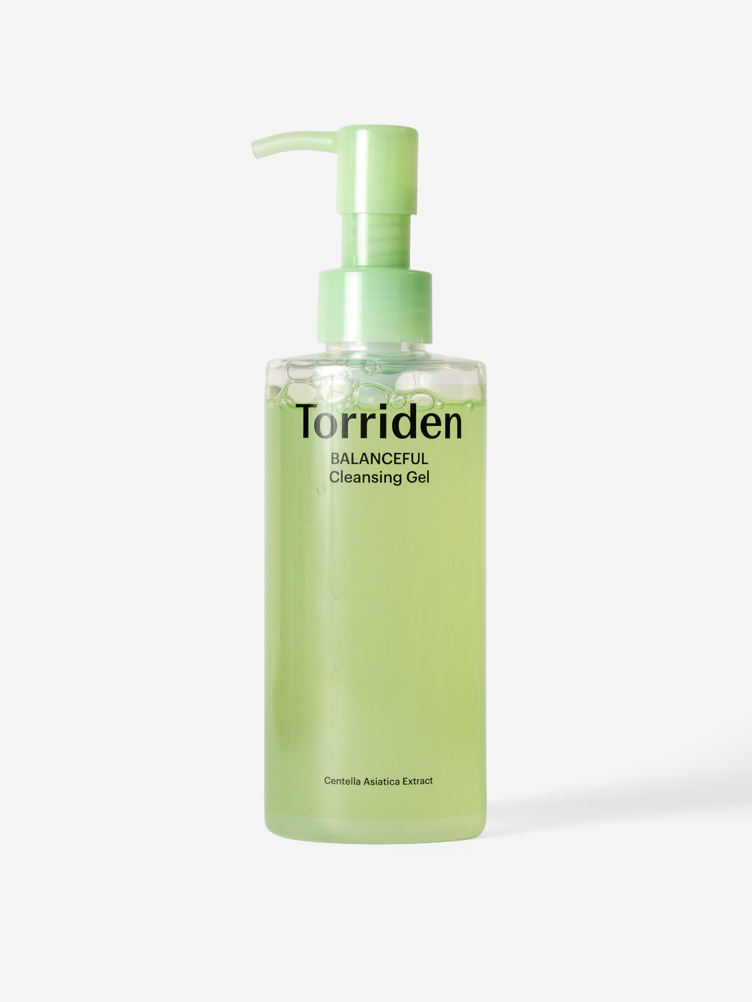 Green bottle of Torriden cleansing gel on a white background