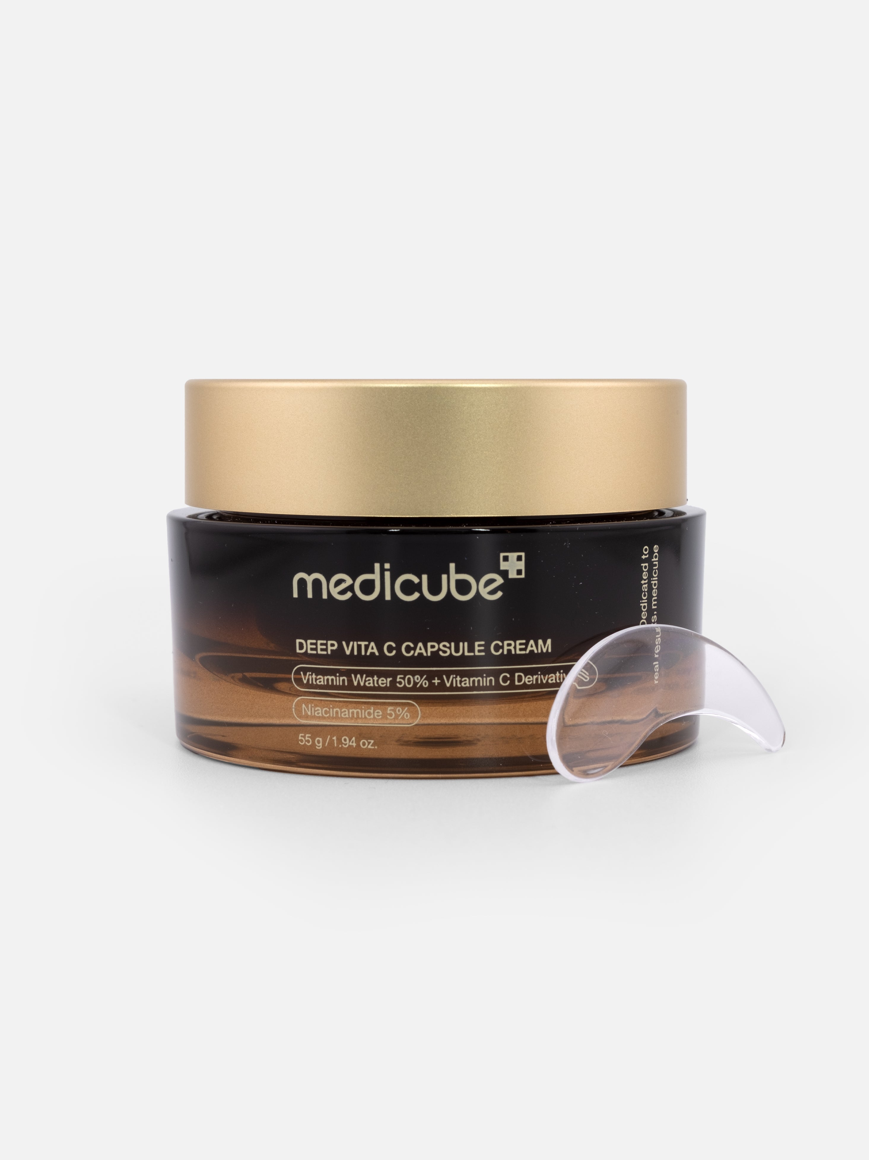 Medicube Deep Vita C Capsule Cream 55g with applicator on a white background